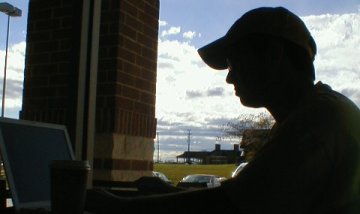 Jonathan Matias studying at Starbucks on Thanksgiving Day, 2004